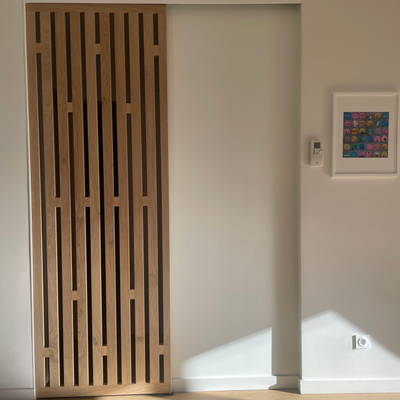 Porte coulissante en chêne